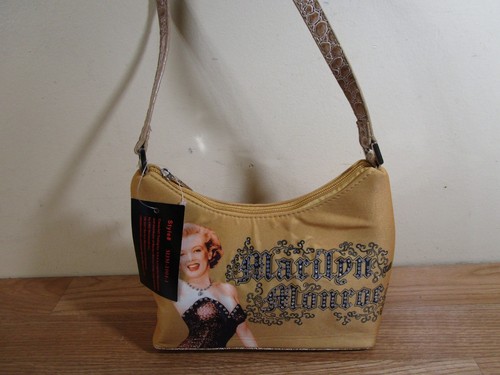 Nwt marilyn monroe gold hand - nwt,